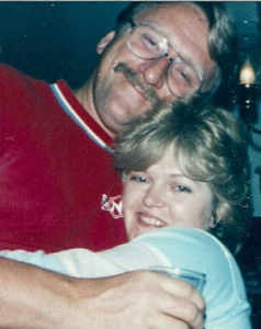 woman hugging man with red shirt