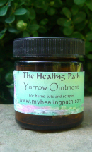 Brown jar with green label "Yarrow Ointment